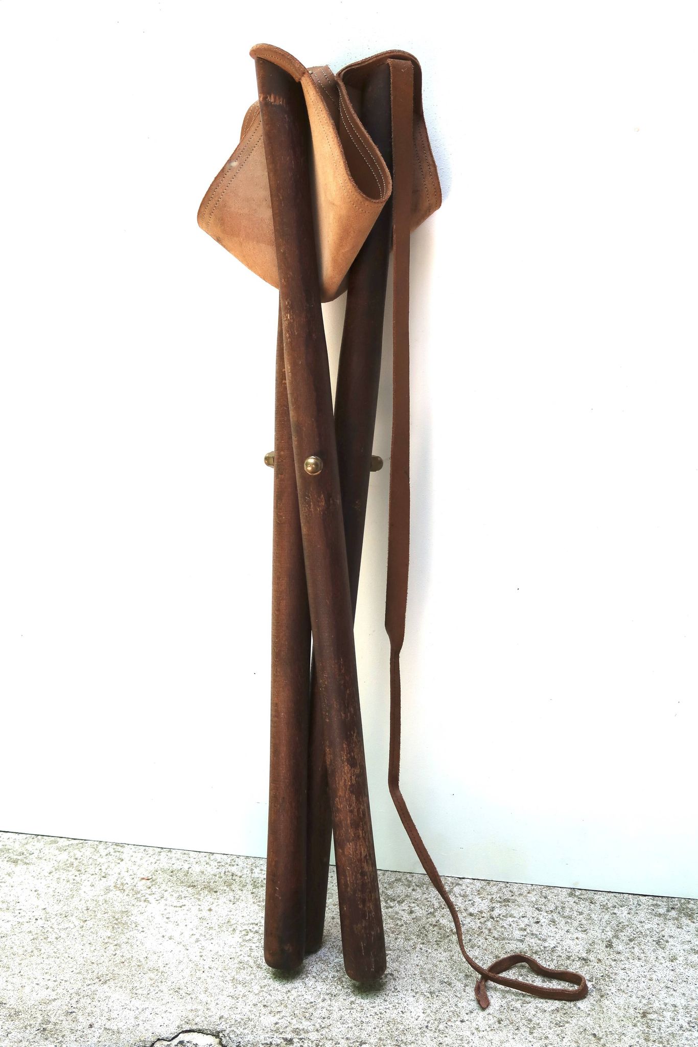 Folding tripod stool in wood and leather, 1950s