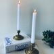 Pair of bronze candle holders signed