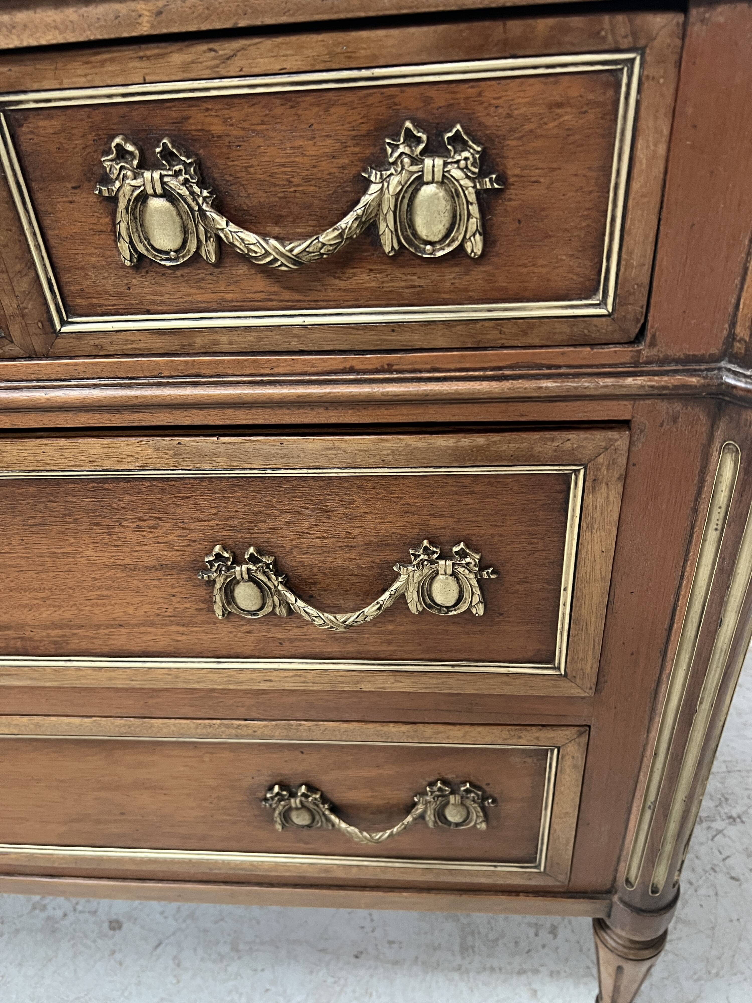 Louis XVI style mahogany commode with a grey veined marble top, 19th century