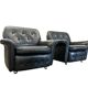 Set of 2 vintage black leather armchairs / individual armchairs