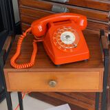 Vintage orange dial phone