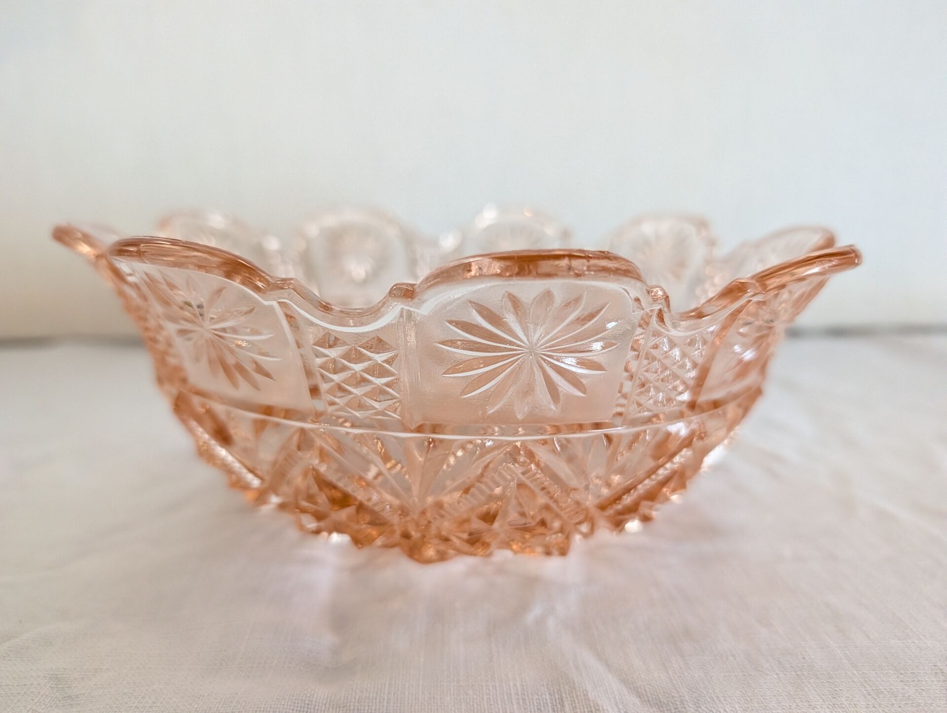 Pressed glass pink coupe with geometric decoration – mid 20th century