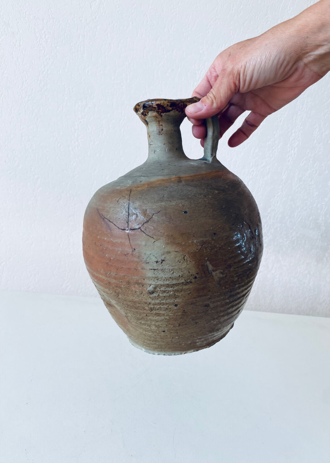 Antique terracotta jug