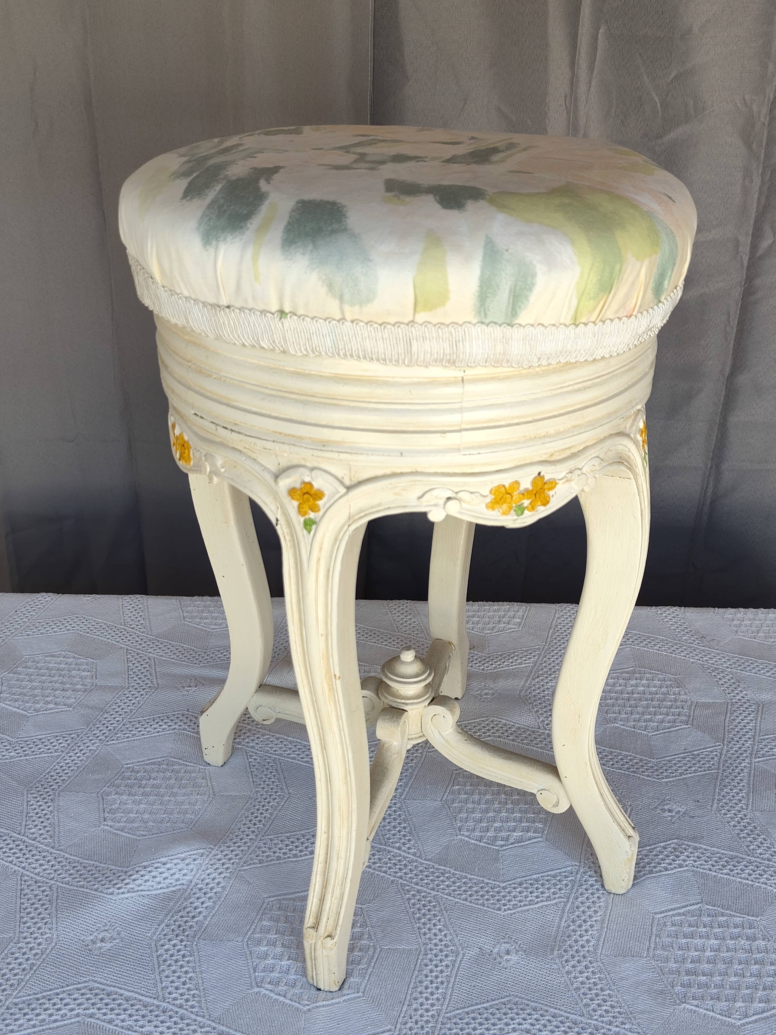 Antique upholstered stool "with screws"