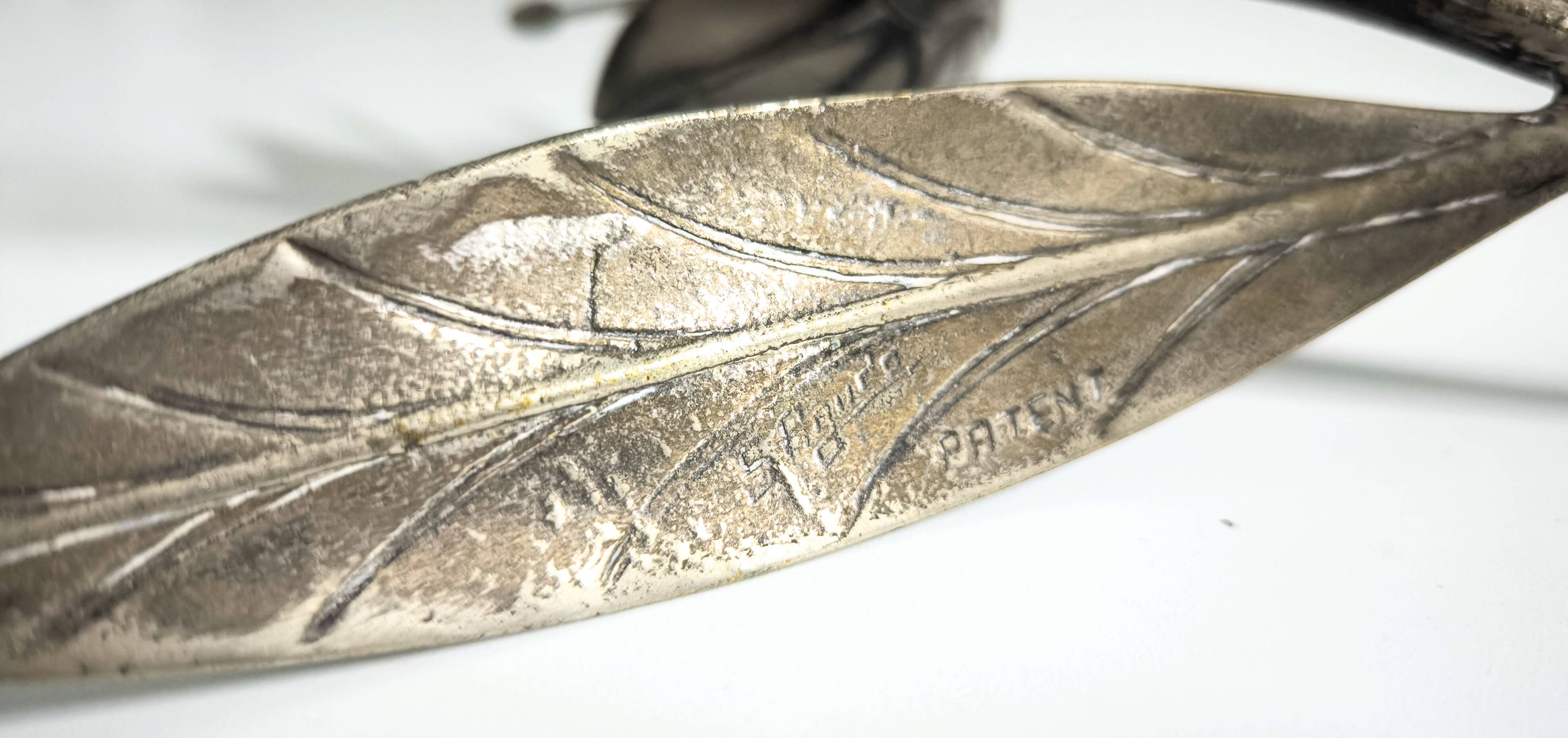 Metal ashtray in the shape of a flower, Sharp 1960s.