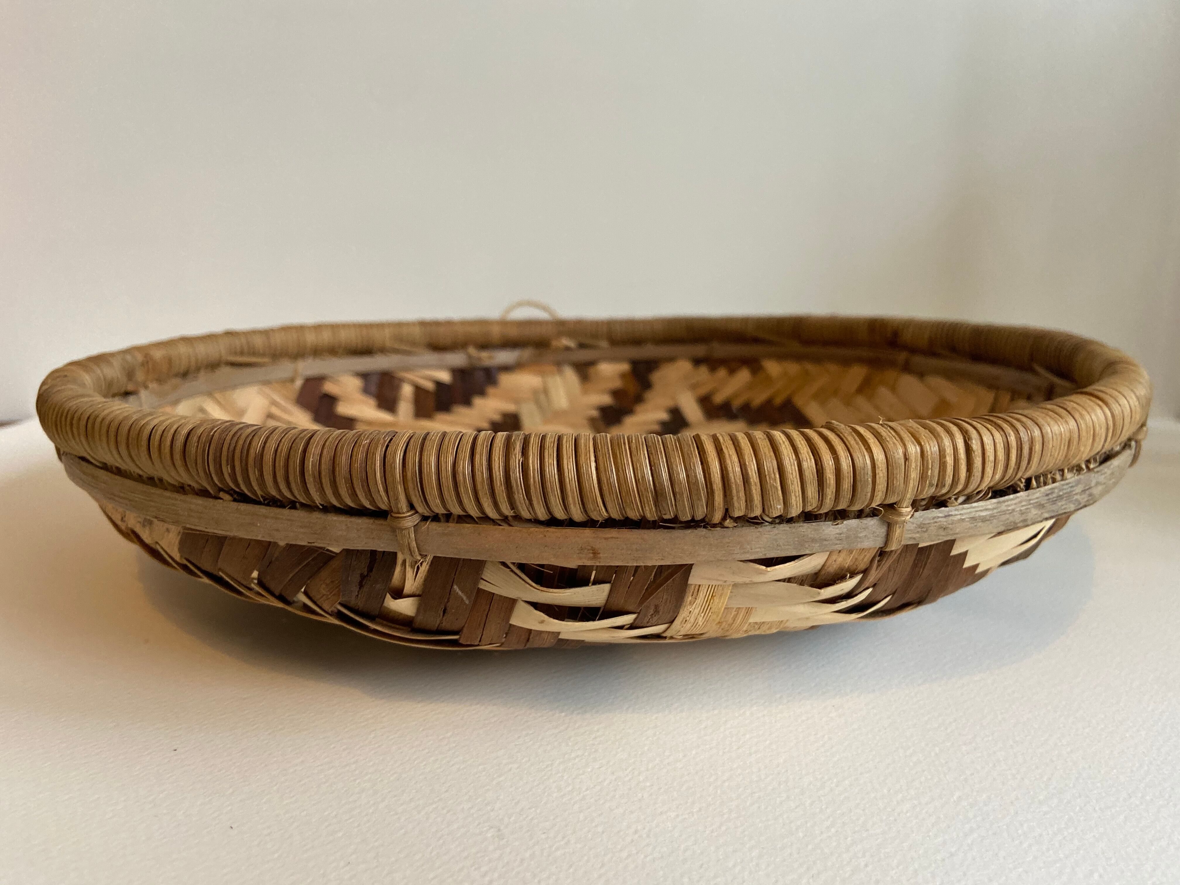 Two-coloured braided wicker basket