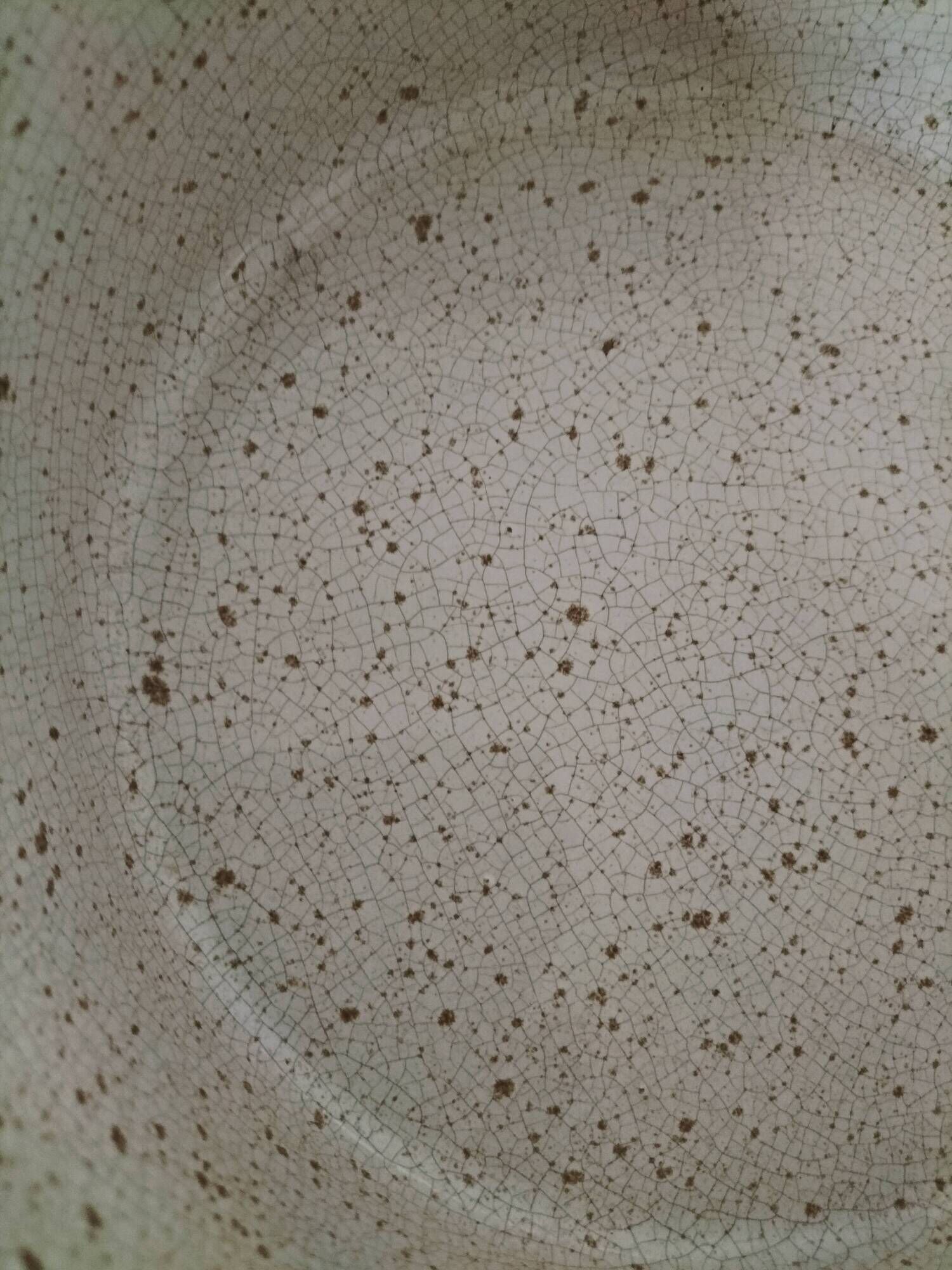 Vintage dish with black and ochre decoration and a speckled crackled interior – 1970s