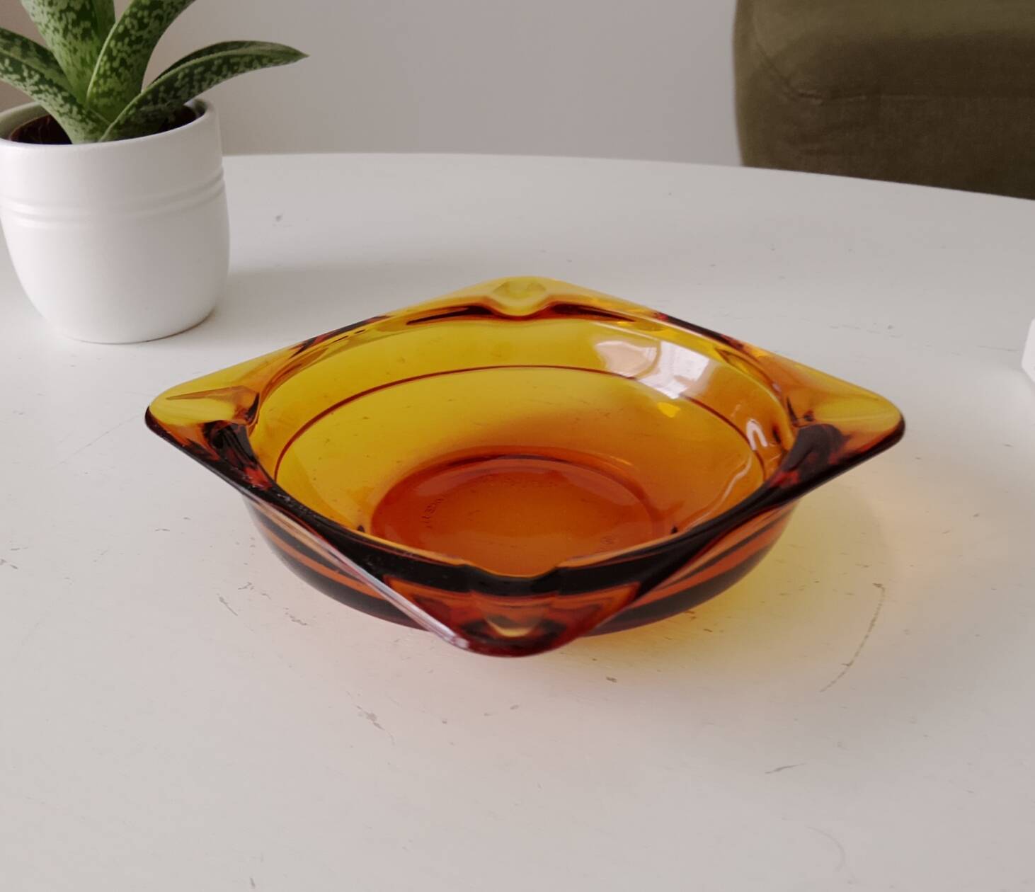 Vintage amber Duralex ashtray from the 1970s.