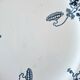 Antique earthenware dessert plates accompanied by a dish