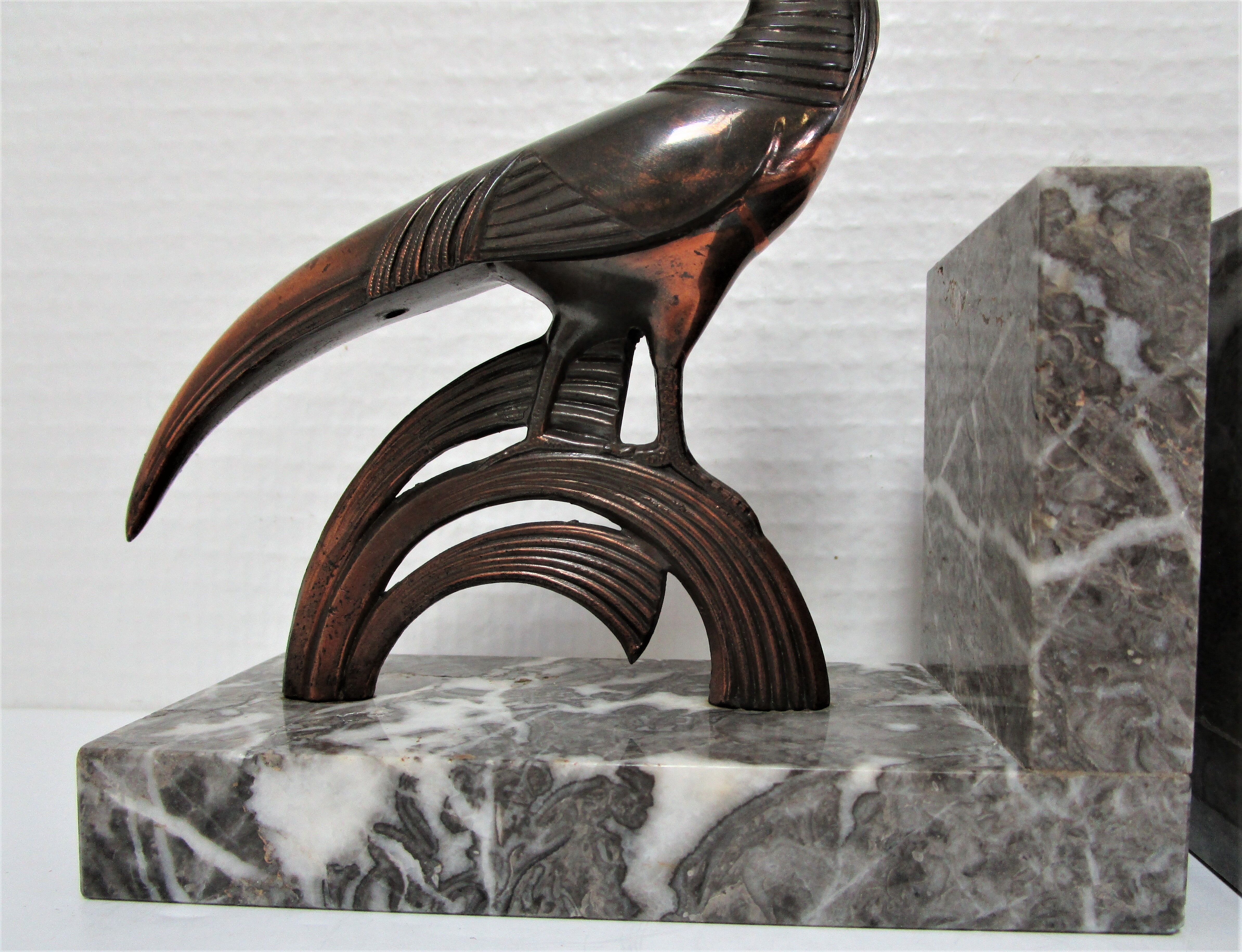 Pair of greenhouse books bird Art Deco metal patinated marble