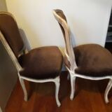 A pair of Louis XV style armchairs in wood and velvet fabrics