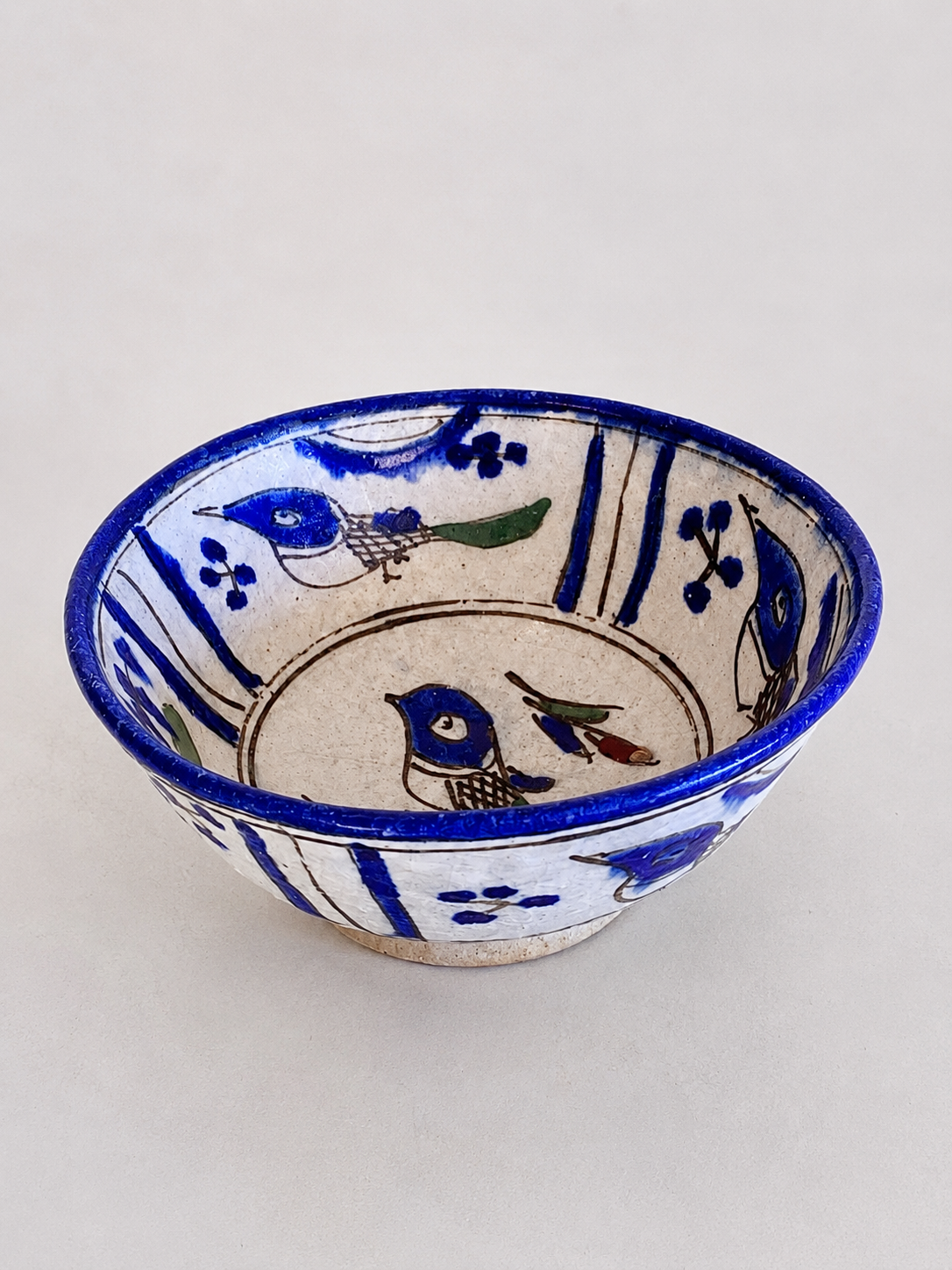 Ancient Persian ceramic bowl in Qajar style.