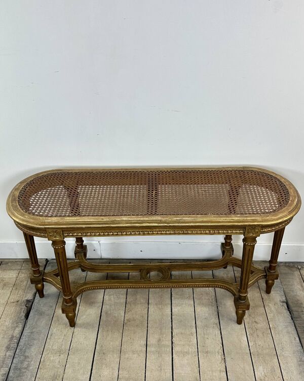 Banquette cannée dorée de style Louis XV