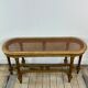 Banquette cannée dorée de style Louis XV