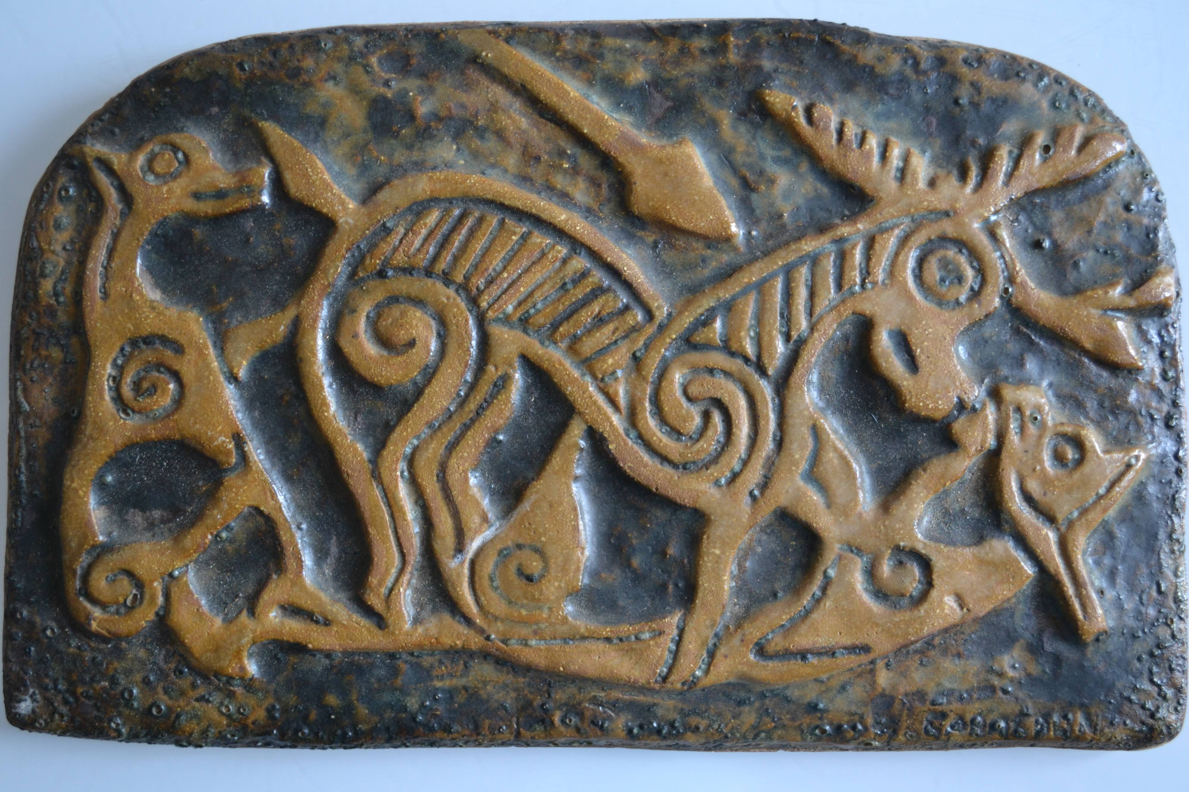 Bas-relief sculpture in terracotta inspired by the Celtic bestiary