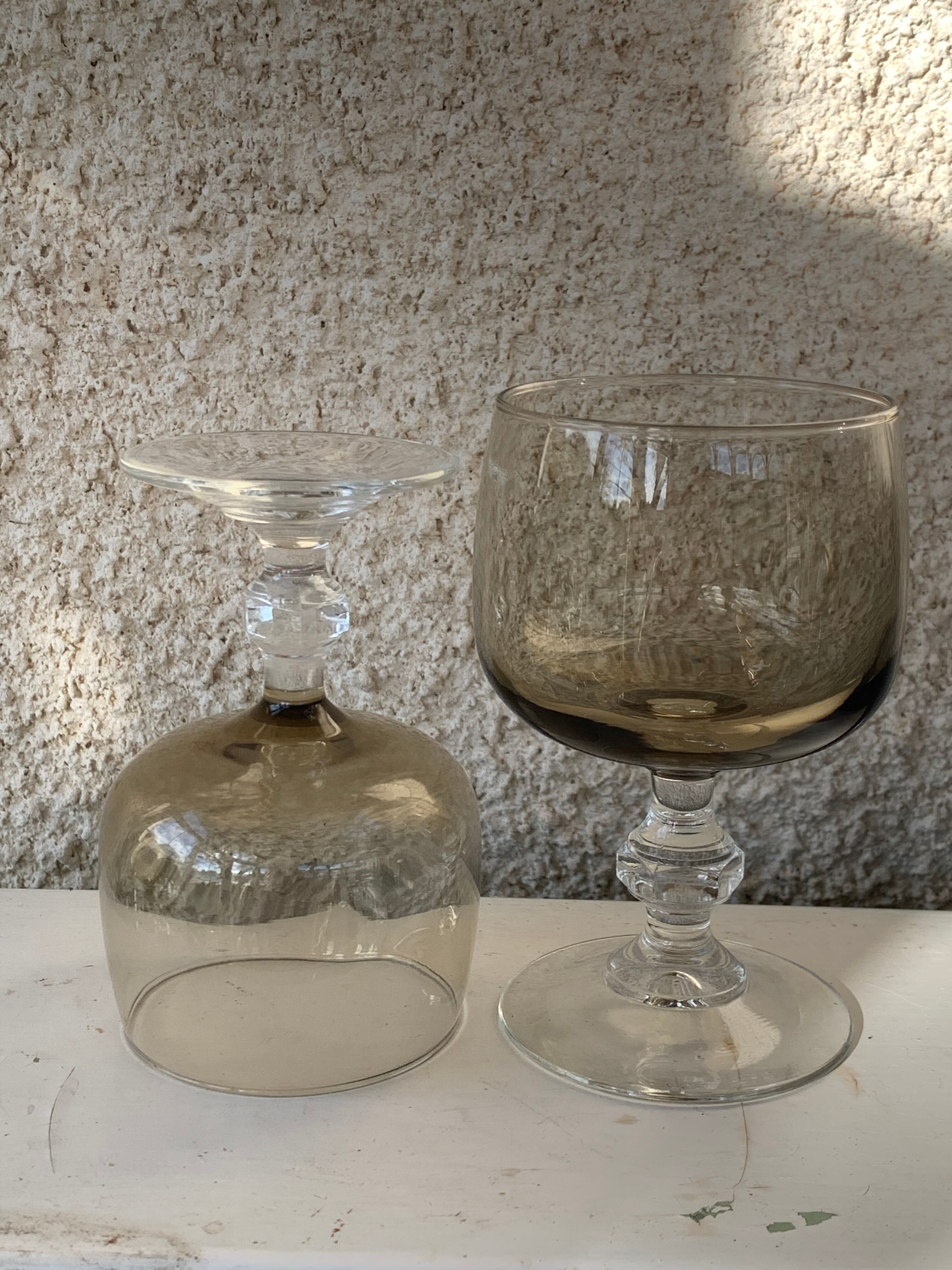 11 wine and water glasses in smoked grey glass and transparent base vintage 1970