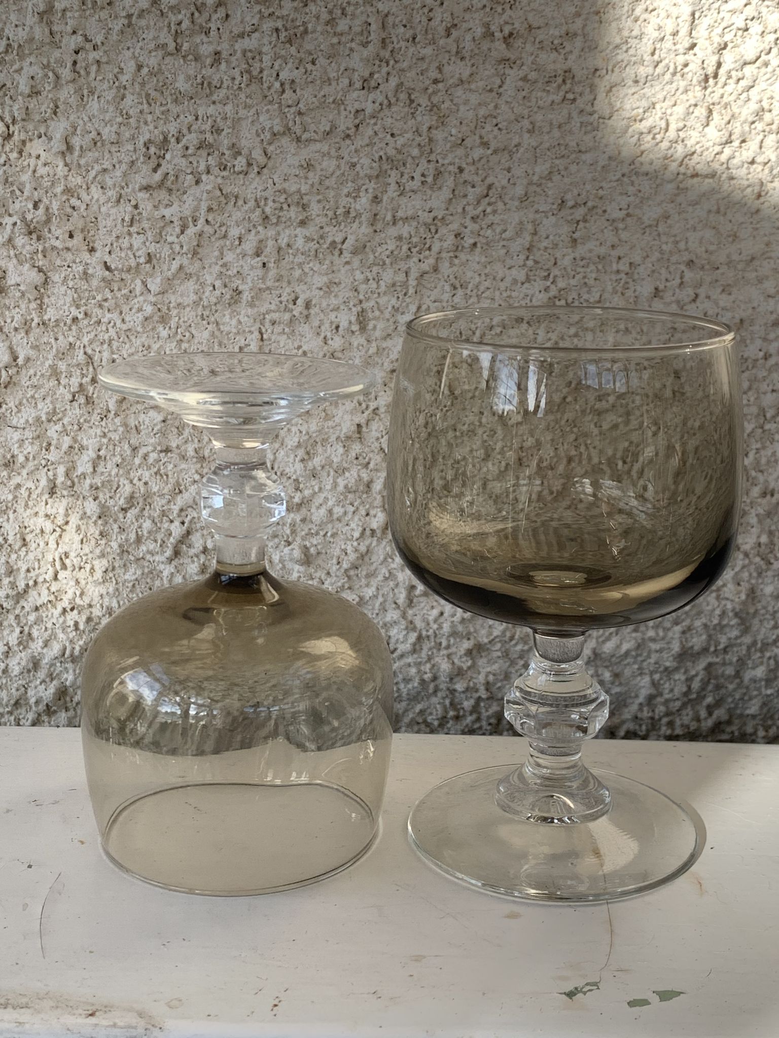 11 wine and water glasses in smoked grey glass and transparent base vintage 1970