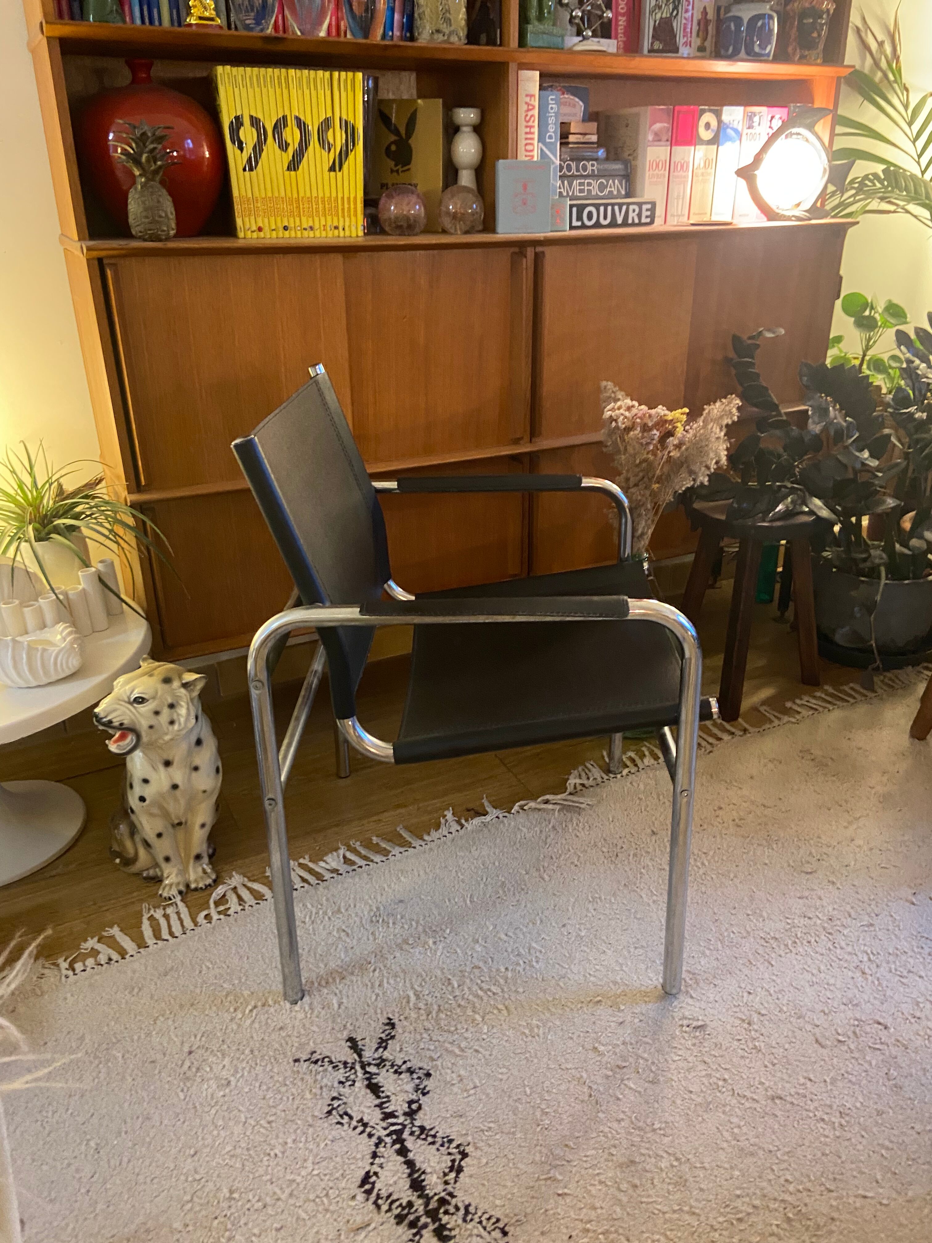 Tubular armchair and vintage skaï