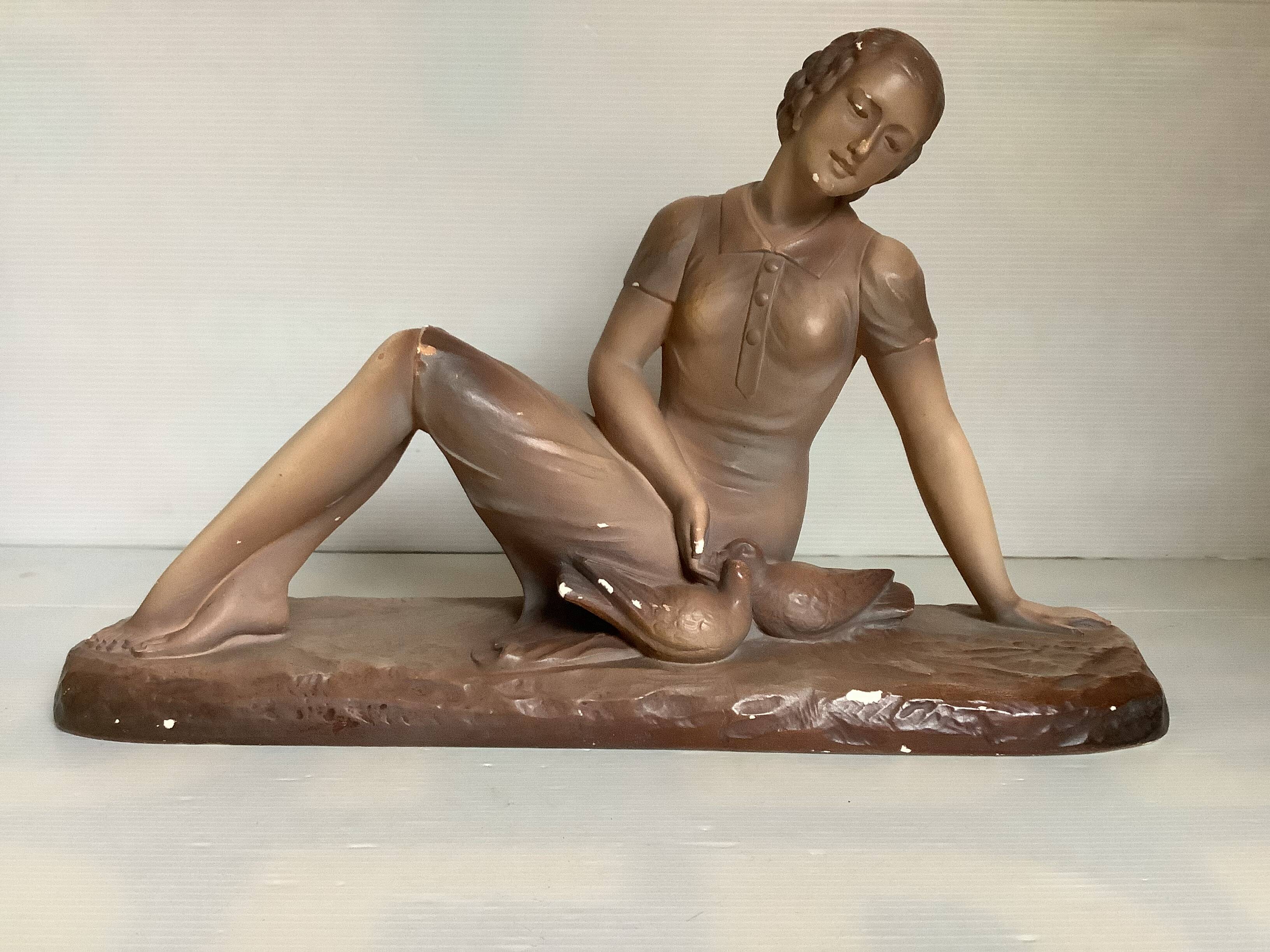 Art Deco statue of the woman with birds