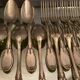 12 forks and 12 spoons in Louis XVI style metal