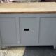 Vintage sideboard painted in gray and raw wood