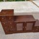 Asian-inspired staircase furniture in solid teak from the 1980s.