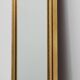 Miroir de style Empire en bois doré du XXe siècle