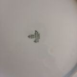 Round dish with a festooned edge, typical of the 70s