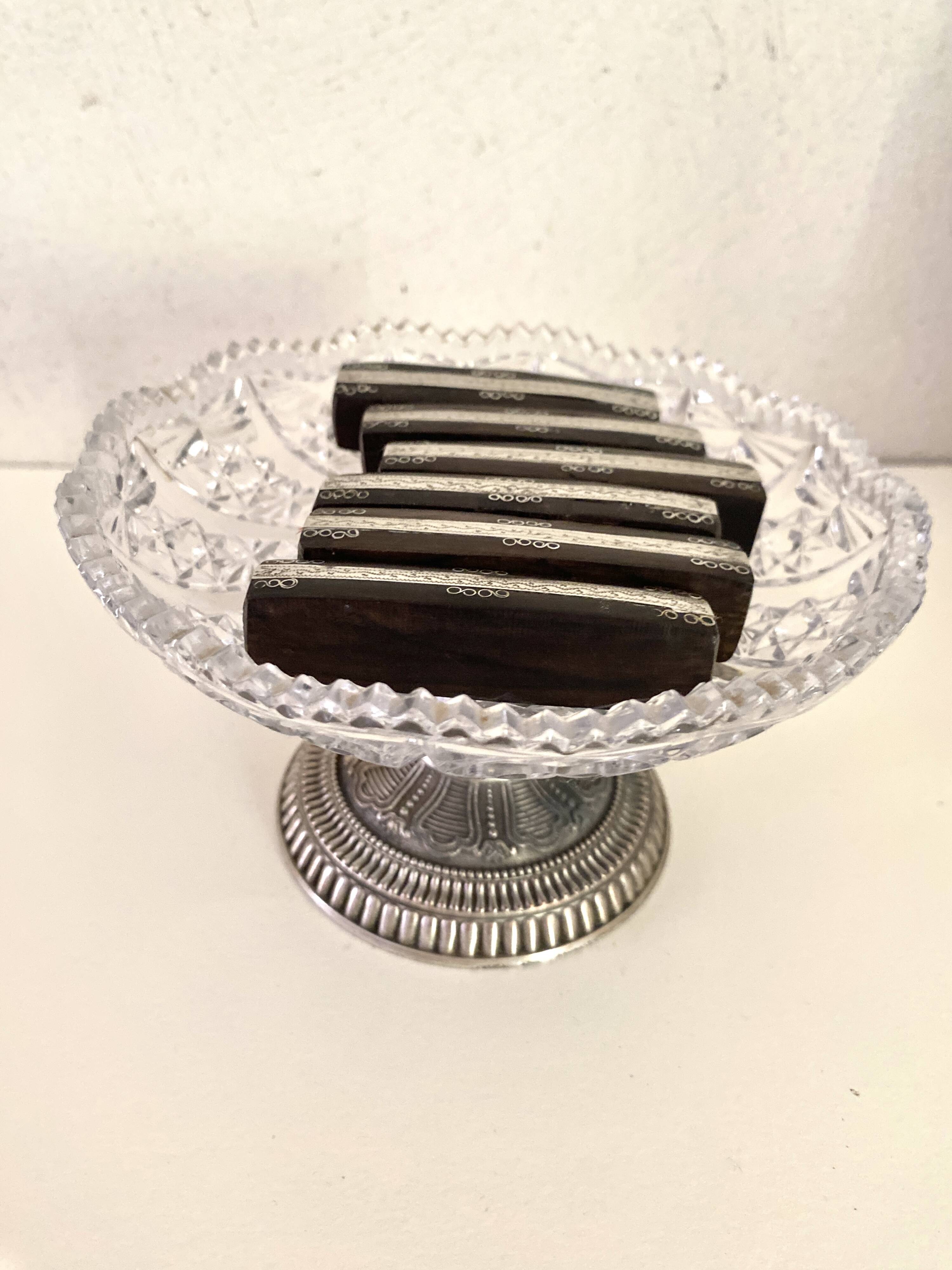 6 knife holders in wood and chiseled silver metal