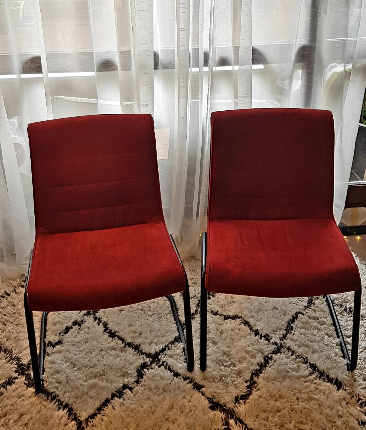 Red suede chairs, Knoll.
