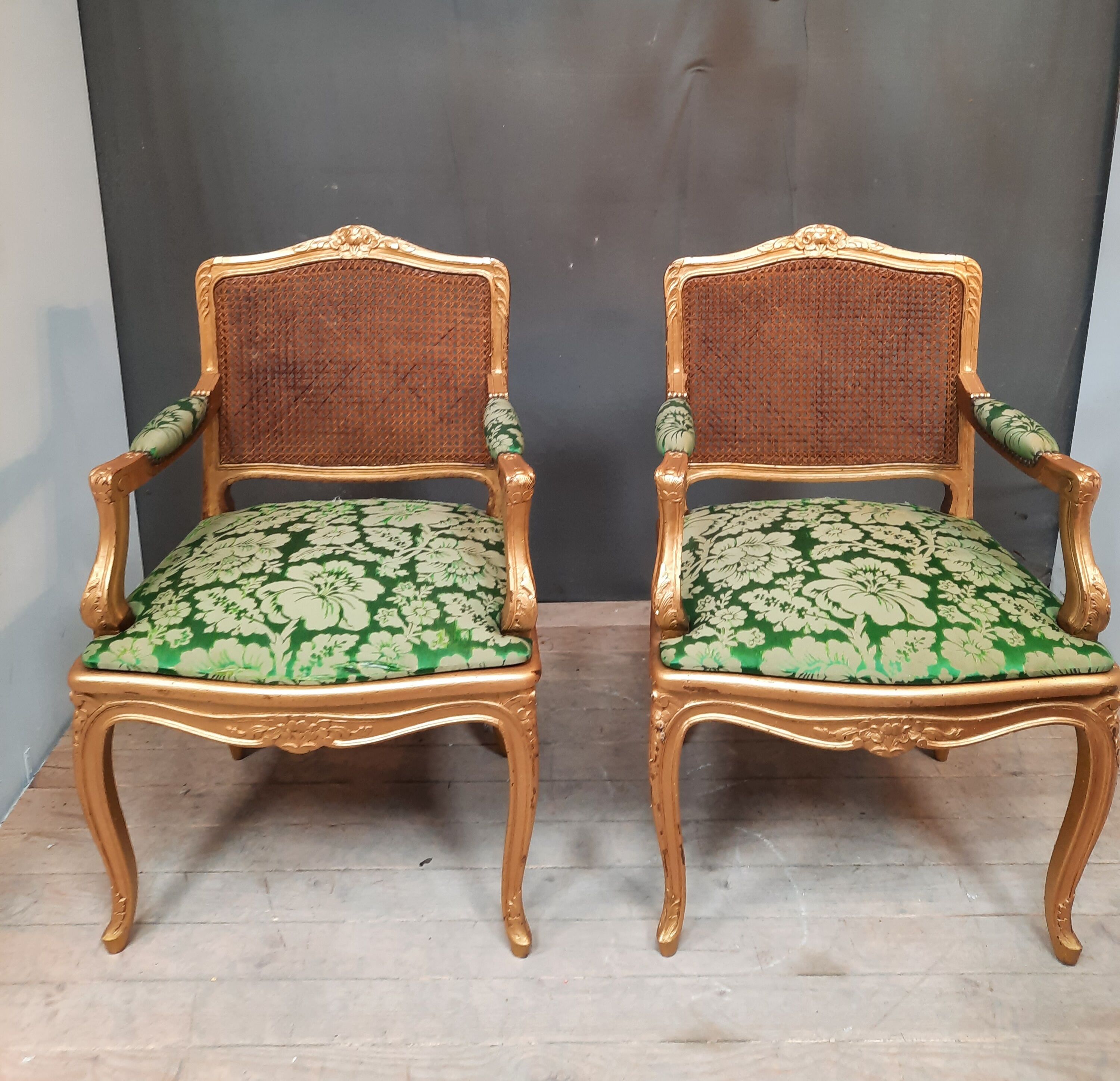 Louis XV-style golden armchair pair