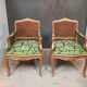 Louis XV-style golden armchair pair