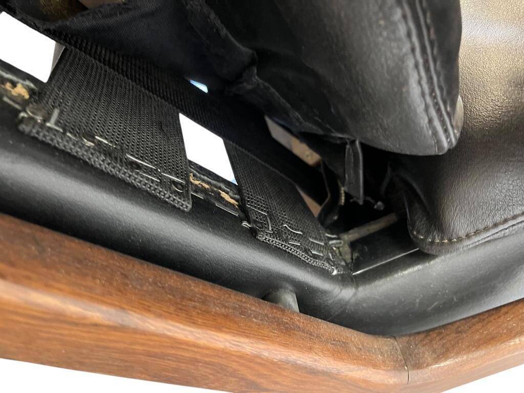 Vintage black leather armchair / Andre Vandenbeuck single seater armchair