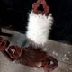 Pair of brutalist tripod chairs in wood and cowhide