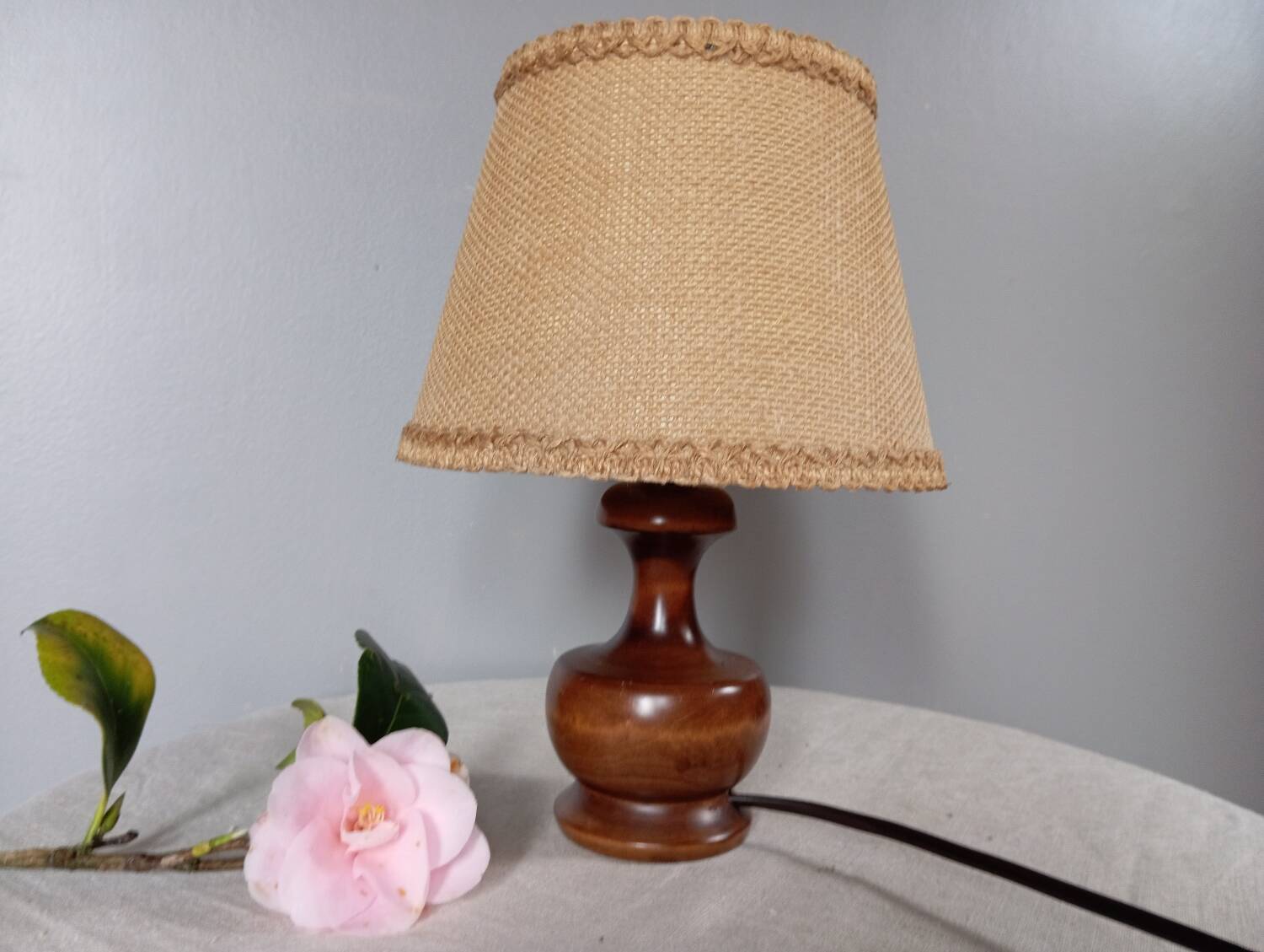 Dark stained turned wood table lamp, camel jute lampshade 1960