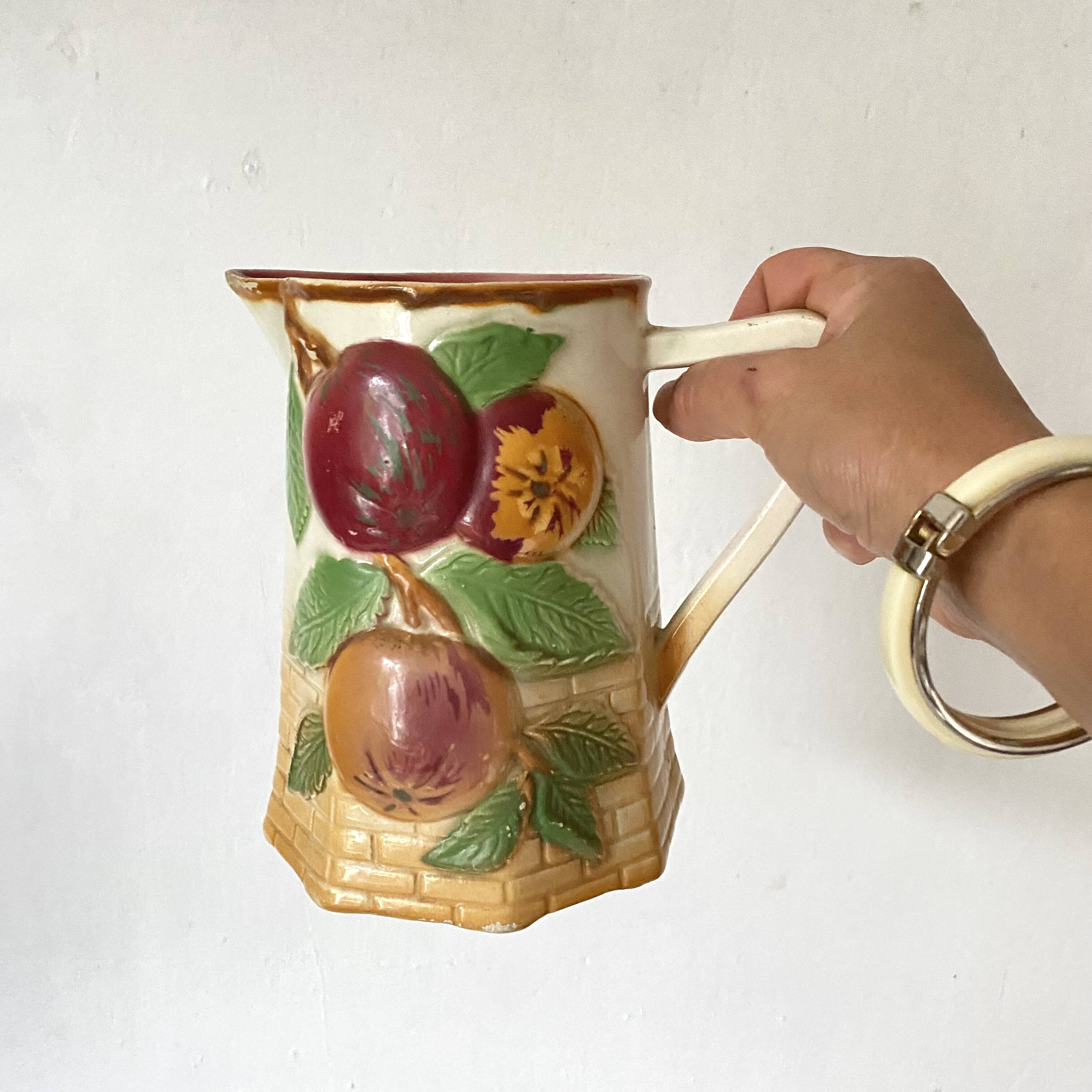Antique pitcher in Apple slip