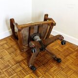 Oak wood office chair with swivel seat and swivel wheels