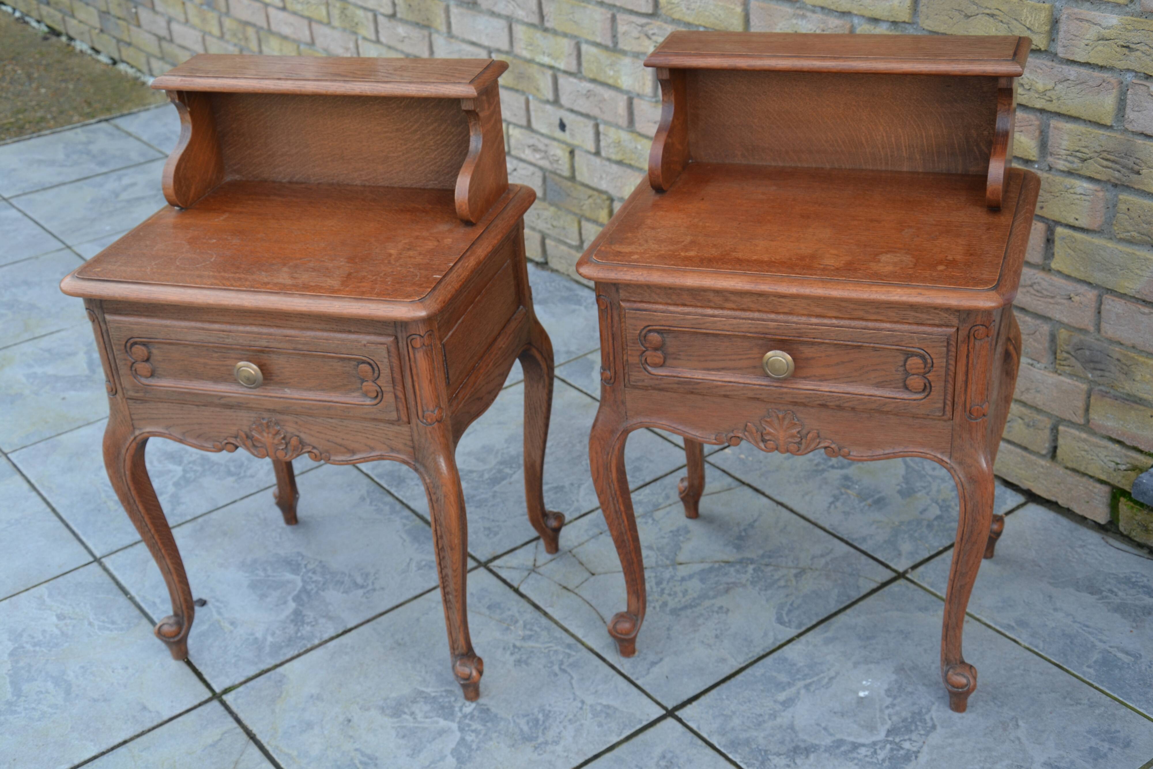 Two oak bedside tables.