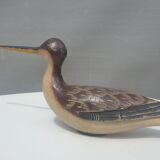 Carved painted wooden curlew