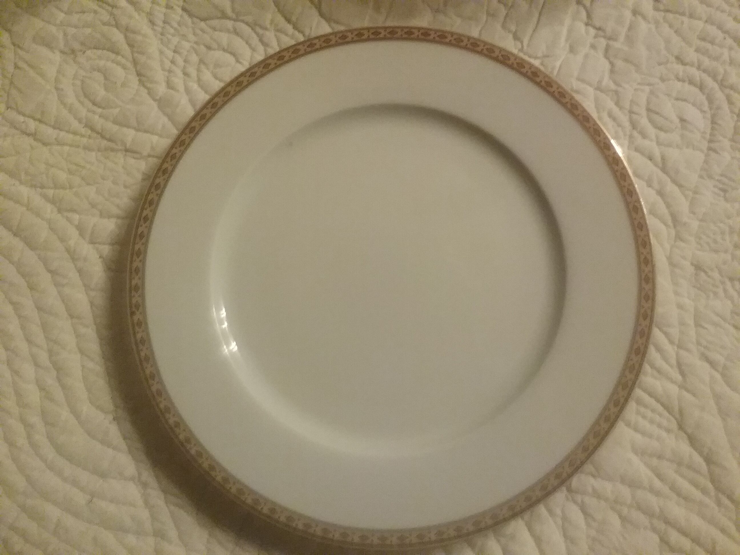 Fine porcelain dessert plates with gilded edging