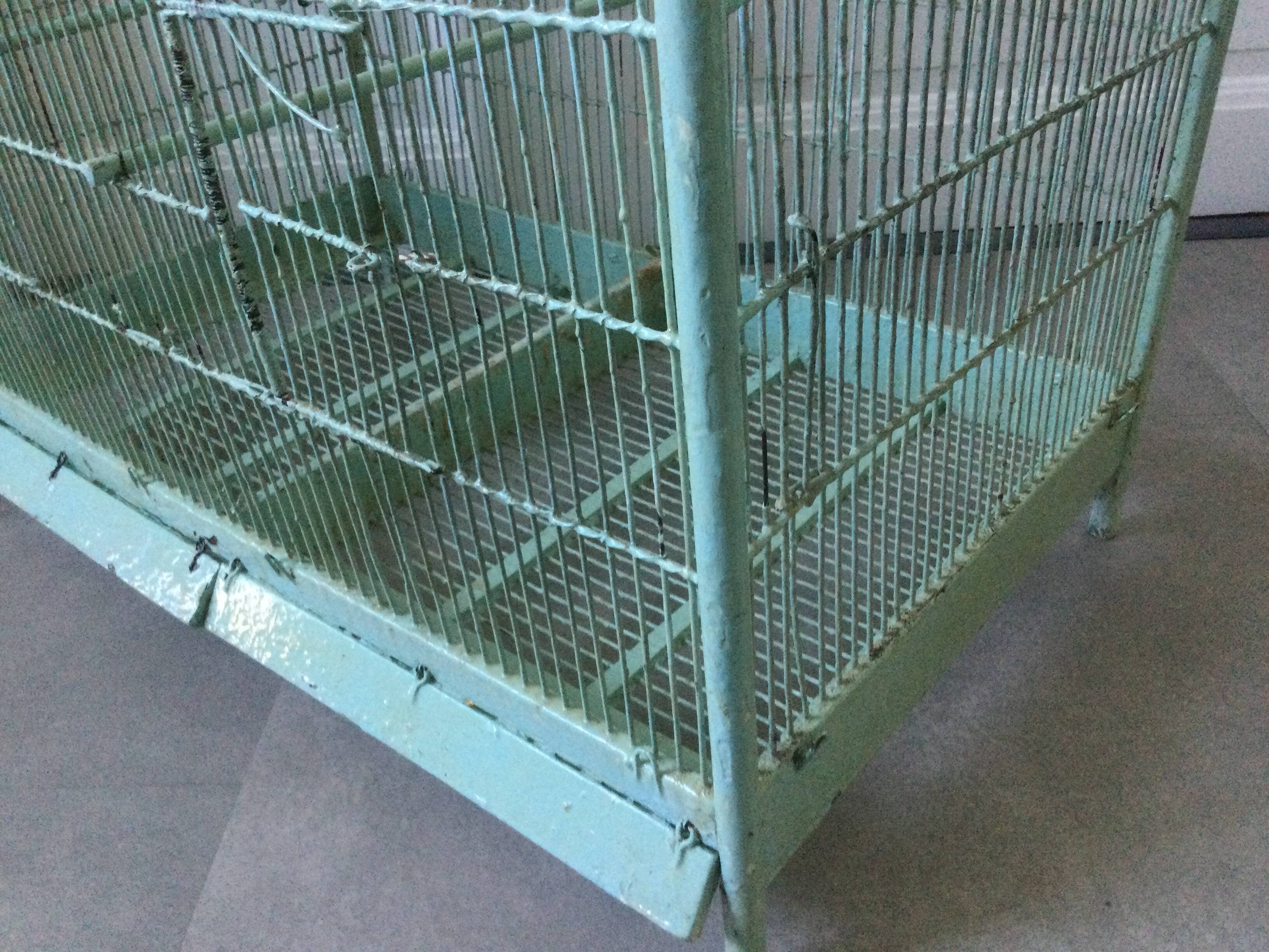 Old wooden and metal birdcage