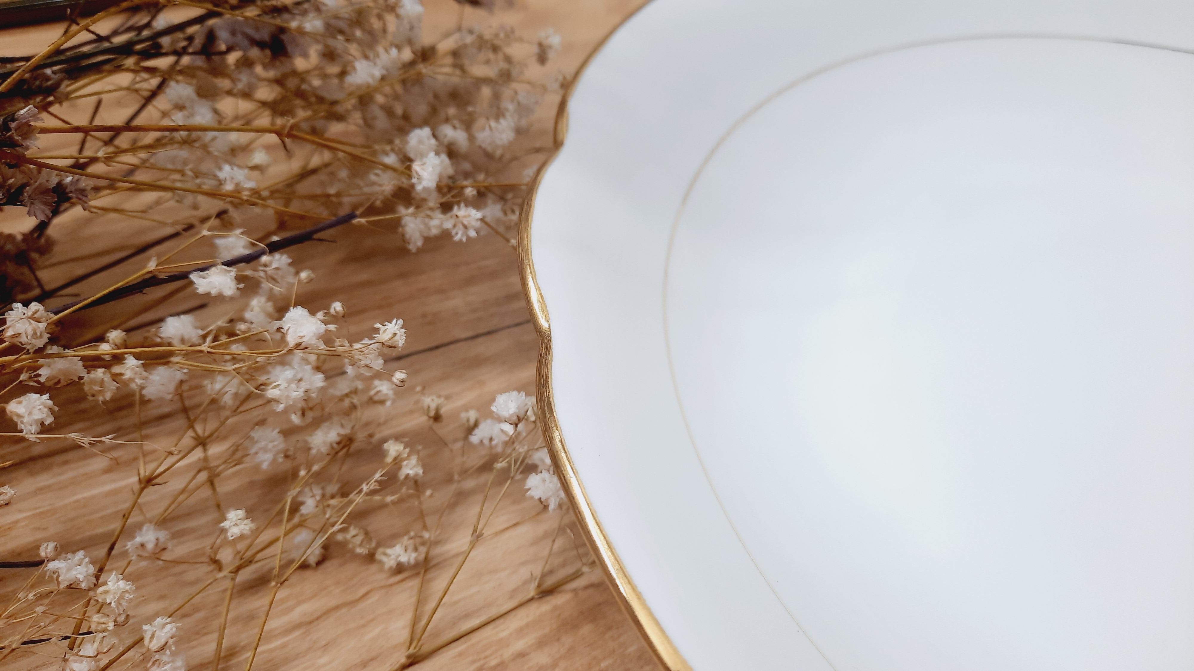 White and gold porcelain bowl