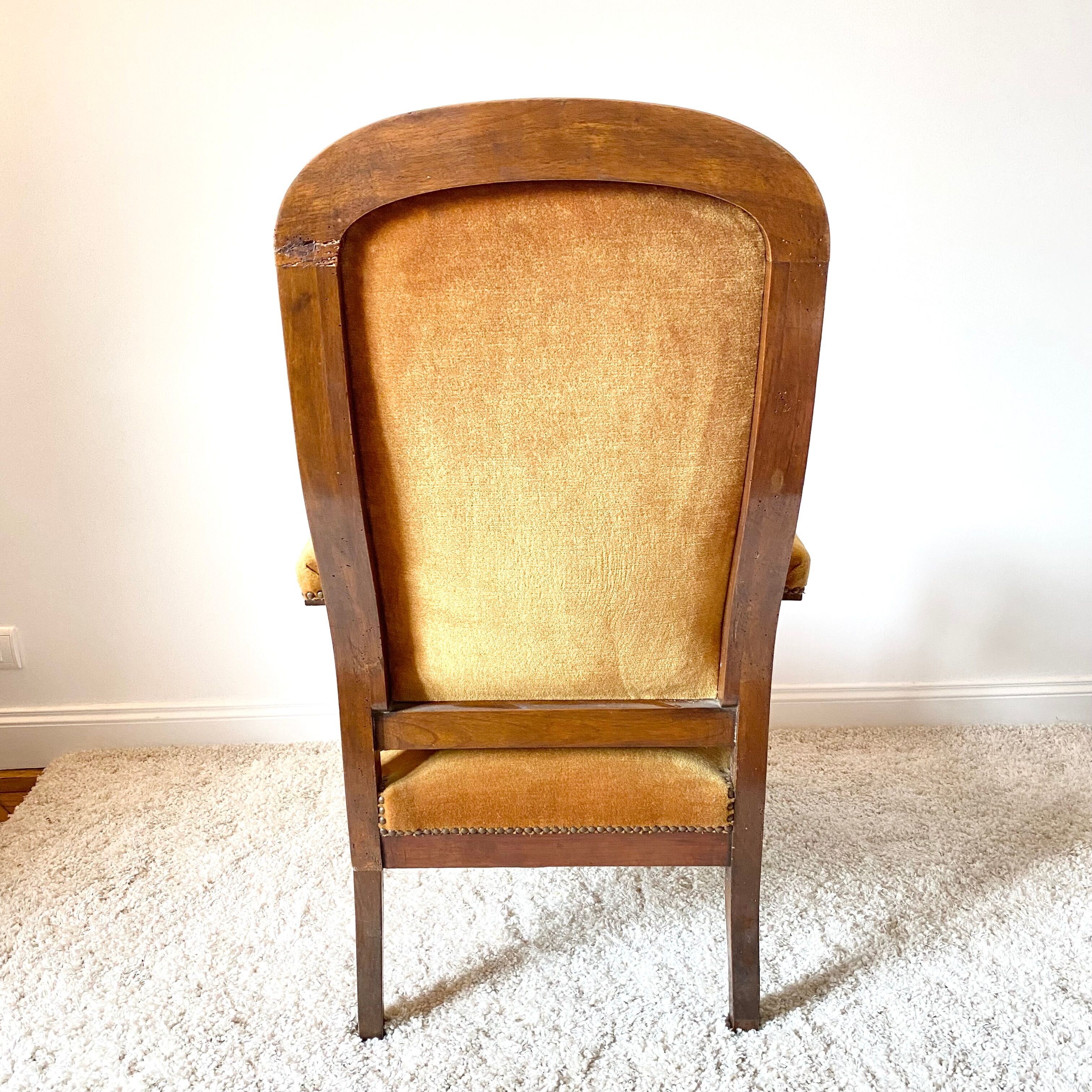 Antique Voltaire armchair