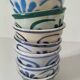 7 stoneware bowls with blue and green ocean-inspired decoration