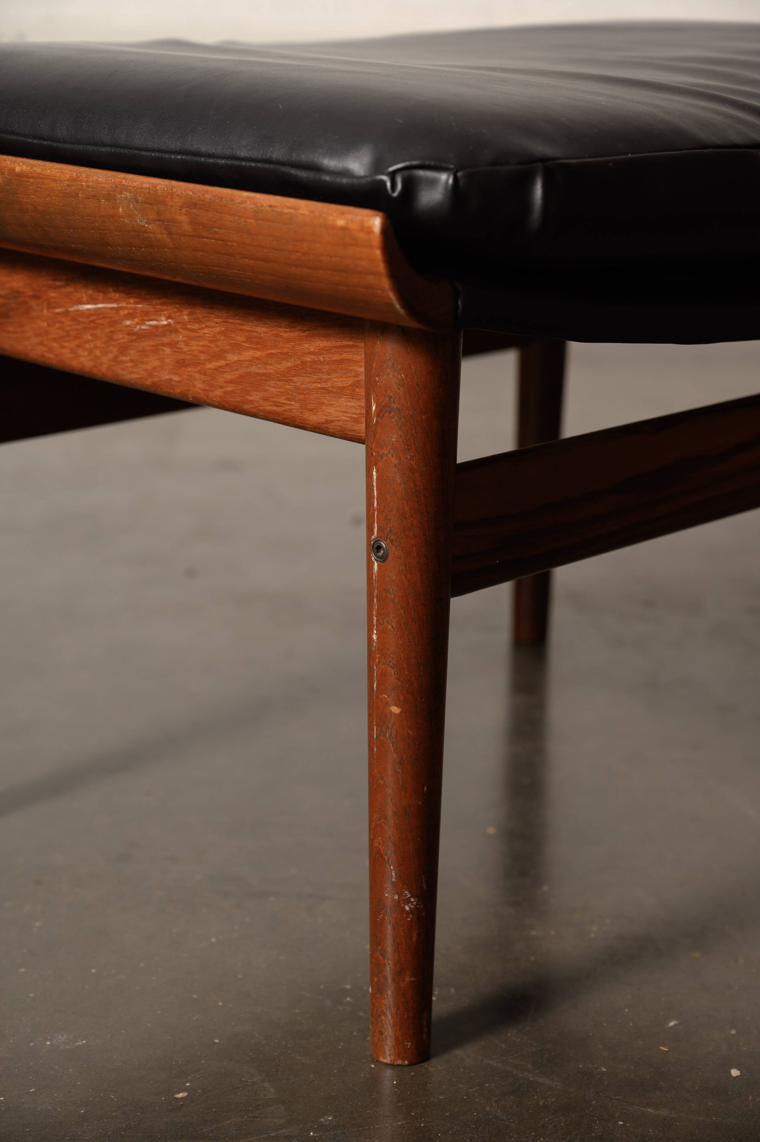 Finished Juhl armchair and its ottoman.