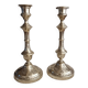 Pair of chiseled brass candlesticks