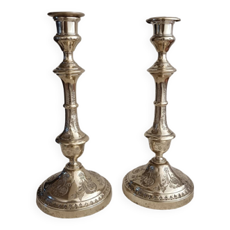 Pair of chiseled brass torch candlesticks