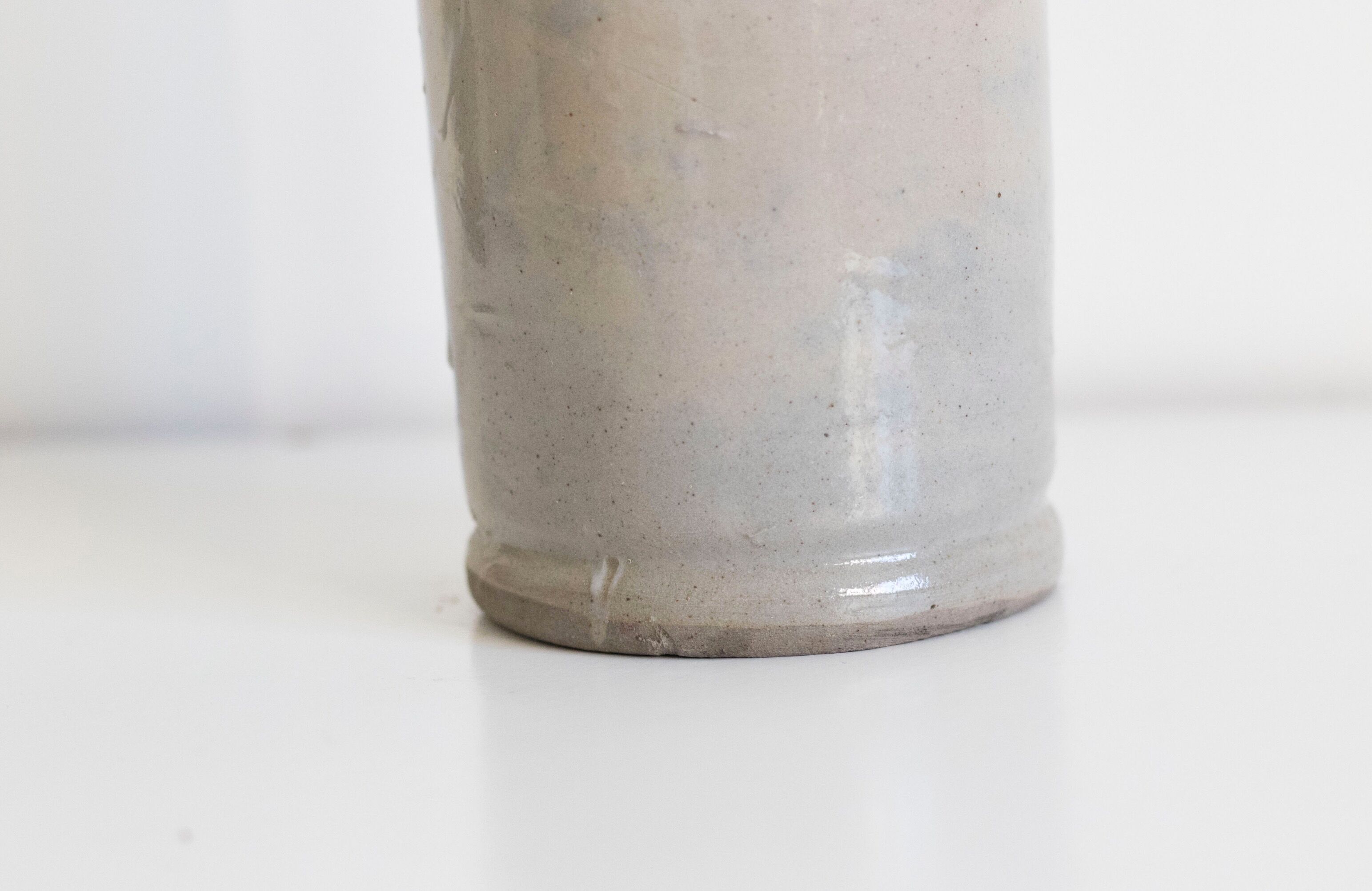 Bottle of enamelled stoneware hot water bottle