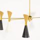 8-light brass chandelier and white-black and gold day blinds