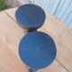 2 carved wooden candlesticks